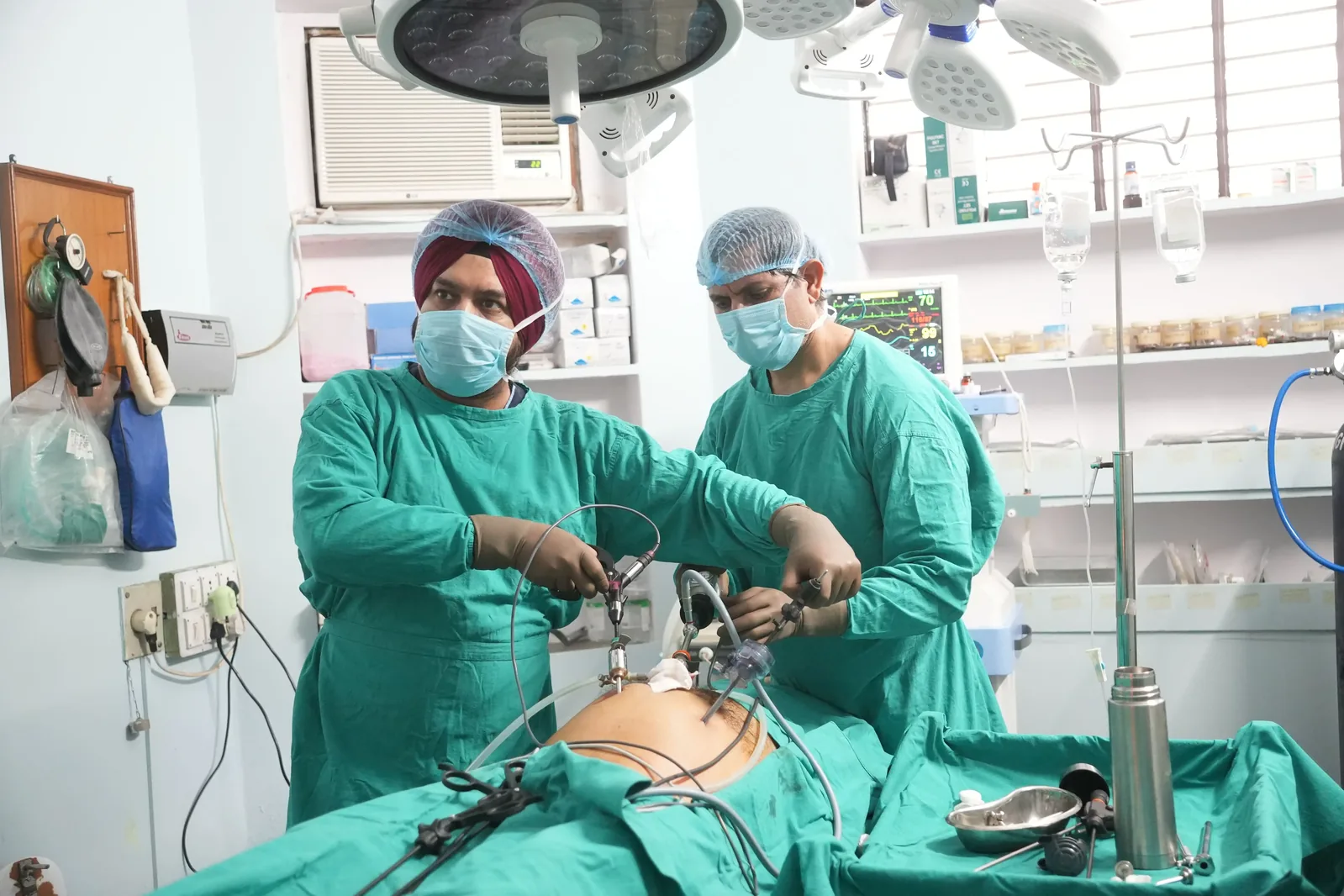 Surgical team performing laparoscopic procedure