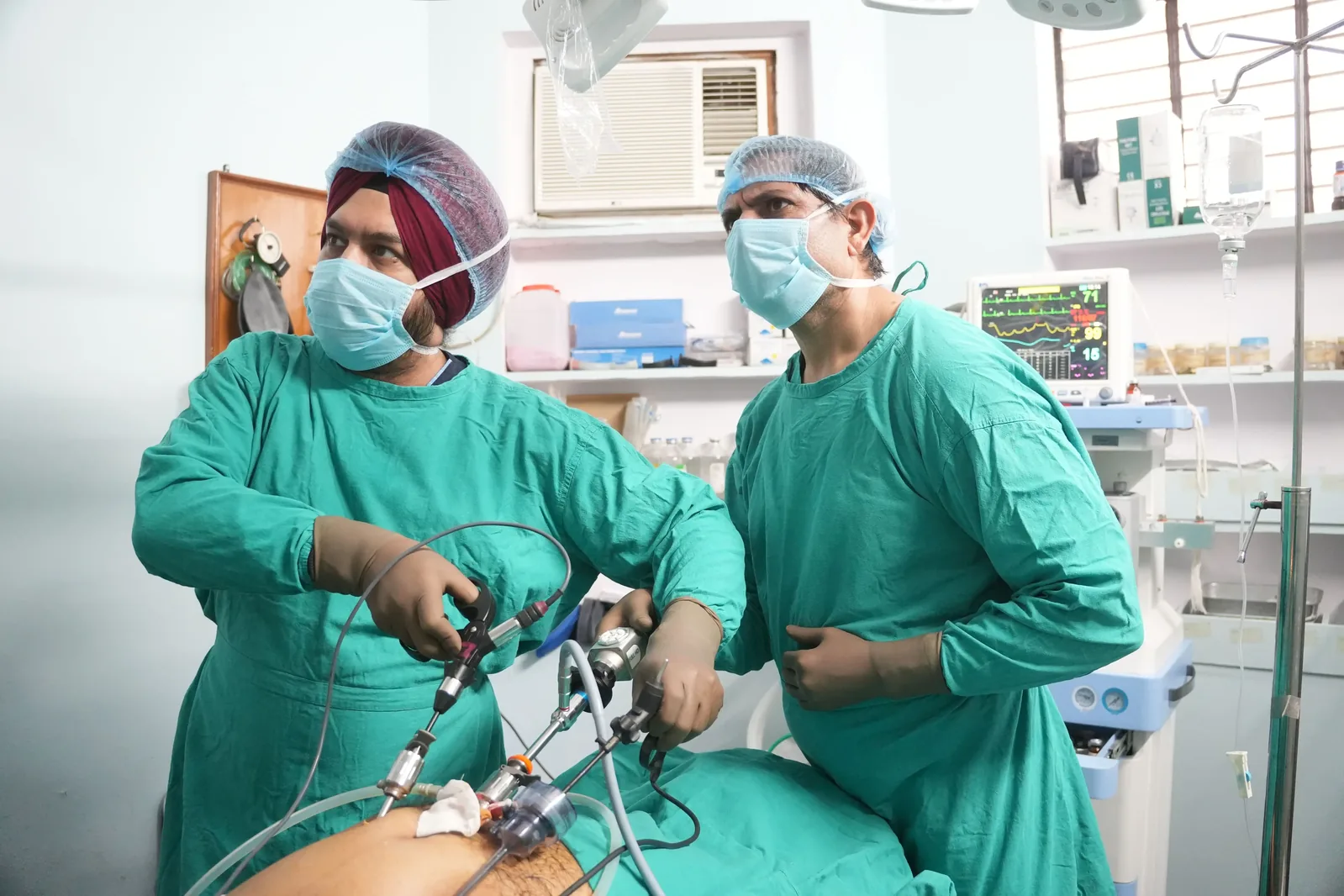 Dr. Mansimrat performing surgery